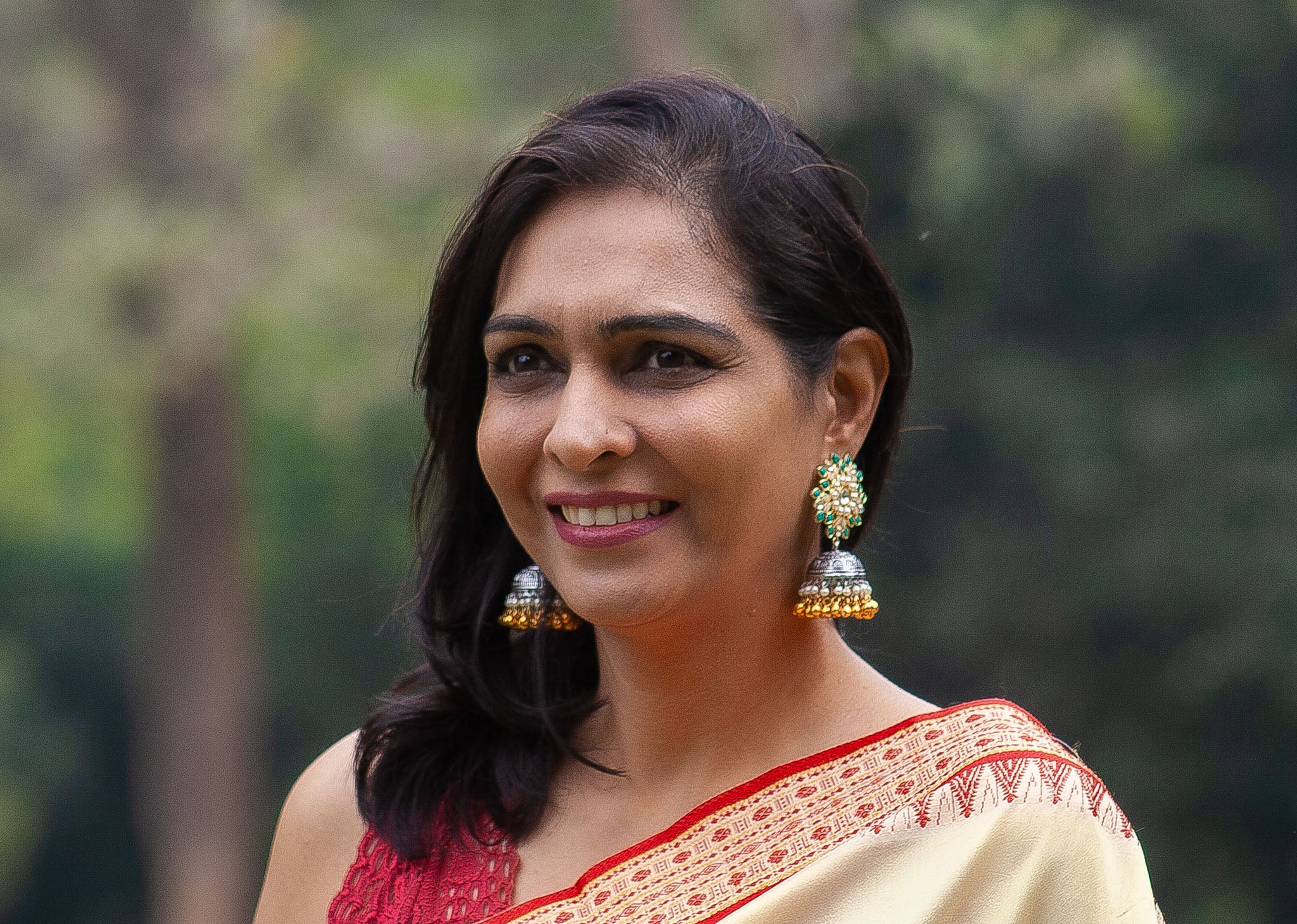 Regal Kundan & Emerald Jhumka Earrings