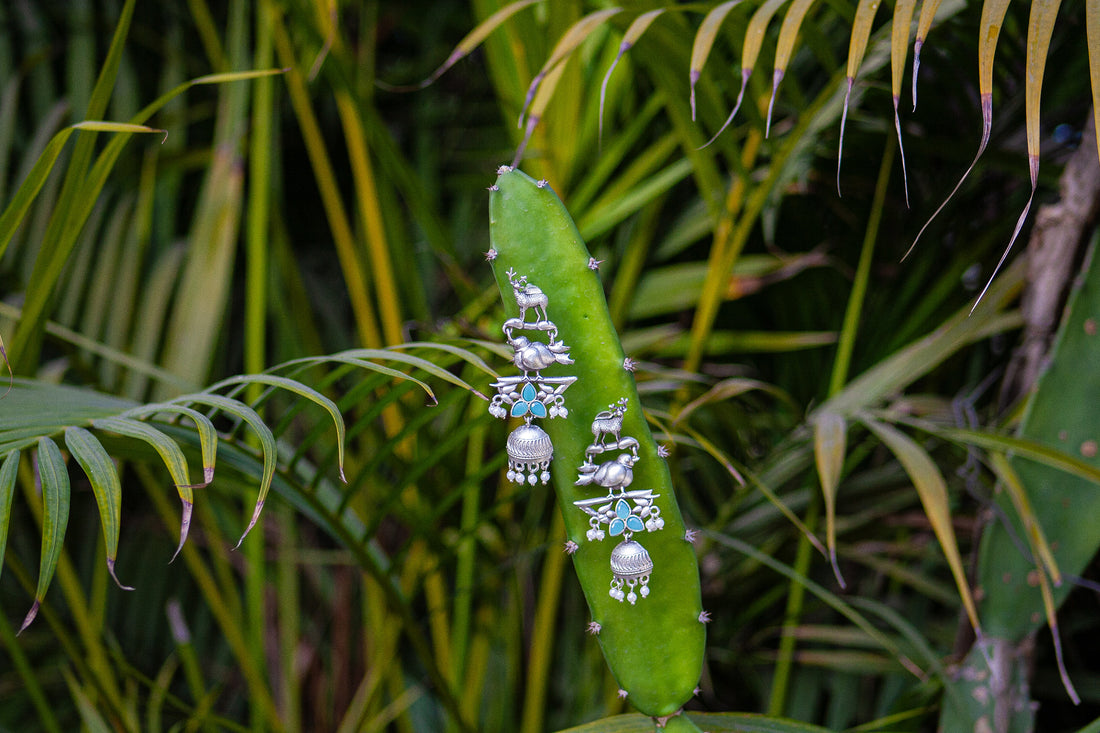 Rustic Oxidized Silver Jhumka Earrings – Tribal Deer & Lotus Design
